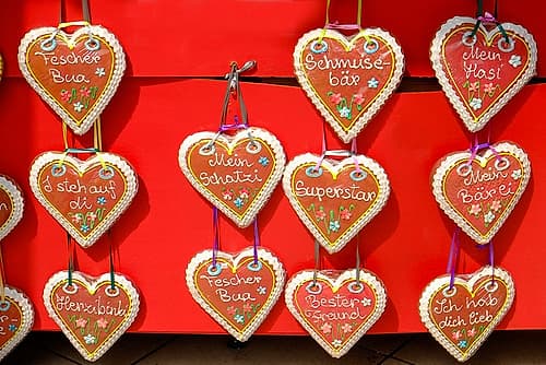 Vienna, Austria. Heart cookies with German sentiments. European Print